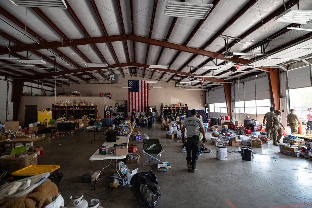 Firehouse bays filled with donated relief supplies